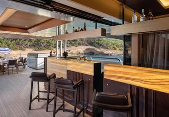 Charter yacht GECO exterior wet bar and stools