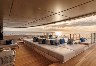 Superyacht charter SILVER FOX exterior deck psace at sunset