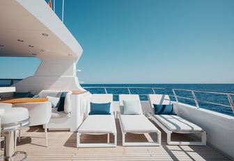 Sun loungers on deck of explorer yacht SEAL