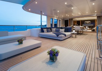 expansive upper deck aft with lots of lounging options on board luxury yacht GO