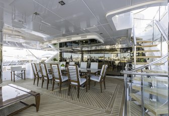 alfresco dining area on the upper deck aft of superyacht ‘King Baby’ 