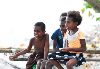 Four children of the Ni-Vanuatu people in Lamen Bay, Epi island, Vanuatu