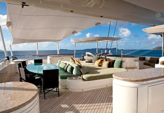 dining and sunning options on the flybridge aboard superyacht HEMISPHERE