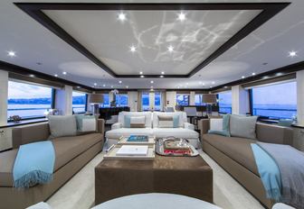 light and airy skylounge with grand piano aboard luxury yacht 4YOU