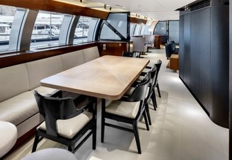 Loft-style dining room on board charter yacht Vertigo