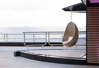 hanging chair on the uncluttered deck aboard motor yacht KISMET