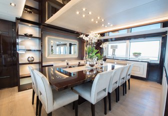 formal dining area in main salon aboard motor yacht JACOZAMI 