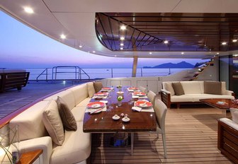 partially shaded alfresco dining and seating on board luxury sailing yacht prana