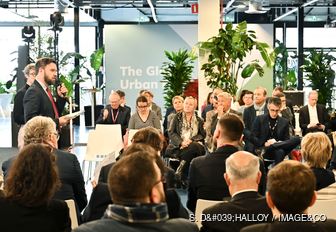 MIPIM conference with speaker in action