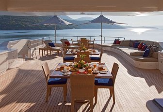 tables set for dinner on the sundeck of charter yacht Mary-Jean II 