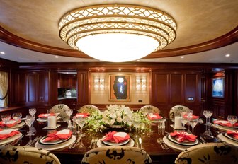 dinner is served in dining salon aboard charter yacht SOVEREIGN 