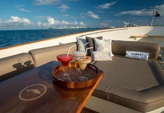 cocktails served after lunch on charter yacht NOMADA as it sails by Belize