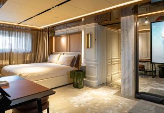 Charter yacht RAJA² cabin with berth and desk in foreground