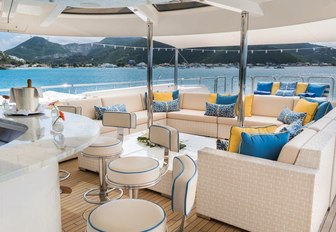 alfresco bar and seating area on the sundeck of luxury yacht TRENDING 