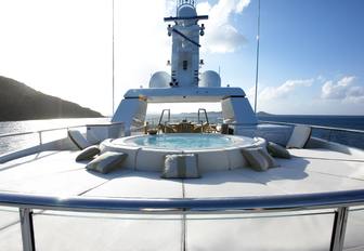 spa pool surrounded by sun pads on the sundeck of luxury yacht HARLE 