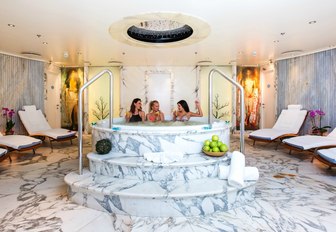 charter guests in spa-clad Jacuzzi on board luxury yacht ‘Moonlight II’ 