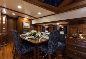 Indoor dining on board sailing yacht MARAE