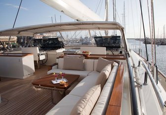 bridge deck seating area and helm on board charter yacht FIDELIS 