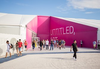 Visitors at an exhibition at Art Basel Miami