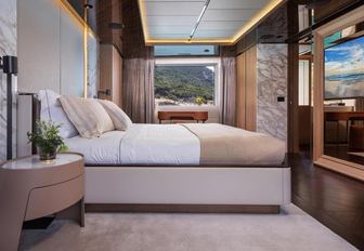 Charter yacht GECO guest cabin with central berth