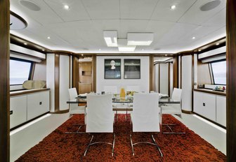 bunker interior dining with white table and chairs 