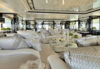 Silver angel main salon lounging area with white sofas and furnishings