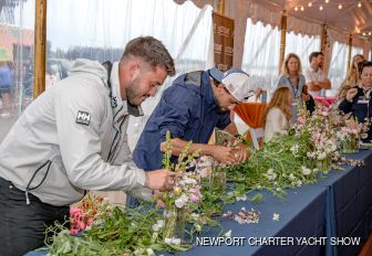 Crew in action at the Newport Charter Yacht Show during a competition in floral arranging