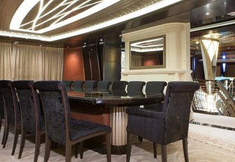 formal dining area on the upper deck of motor yacht KISMET 