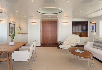 table and lounge area on board luxury yacht SENSES 