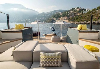 aft deck lounging area with plush sunpads on board luxury yacht ZULU 