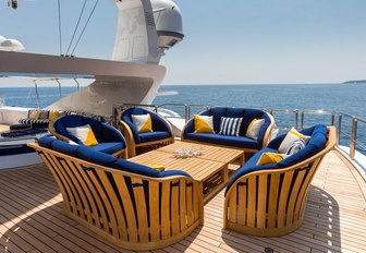 newly upholstered alfresco seating area on the sundeck of charter yacht Air