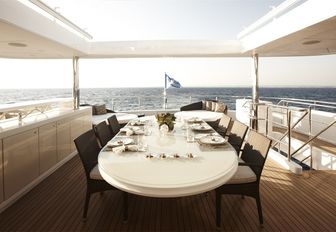 alfresco dining on upper deck aft aboard charter yacht E&E 