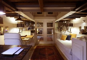 library and seating area in lower deck aboard superyacht ALEXA 