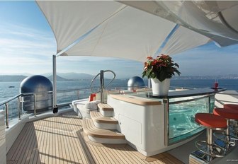 The Jacuzzi situated on the exterior of luxury yacht Excellence V