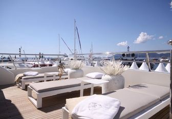 Sun loungers on deck of explorer yacht SEAL