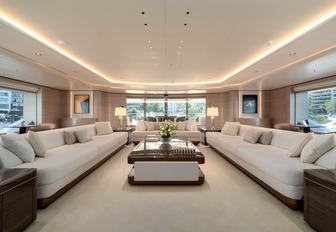 Open plan lightly colored interior on superyacht O'PARI