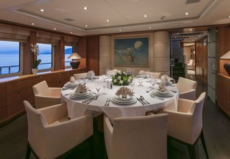 formal dining area in the main salon of luxury yacht L’EQUINOX