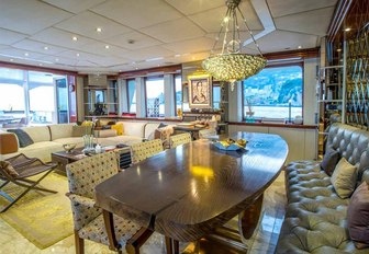 formal dining area in the main salon of charter yacht ZULU 