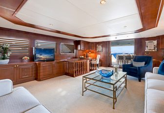 spacious main salon with view onto main deck aft on board superyacht PRAXIS 