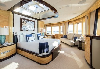 light and airy master suite with large bed on board charter yacht Excellence V