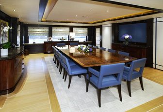 dining table in the main salon aboard luxury yacht Baton Rouge 