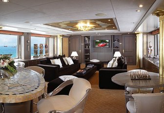 light and airy skylounge with mosaic-topped bar on board motor yacht DENIKI