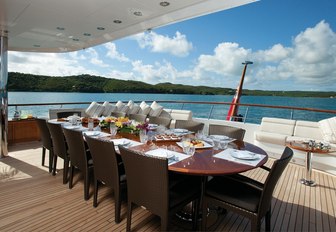 alfresco dining option on the bridge deck aft of charter yacht MAJESTIC 