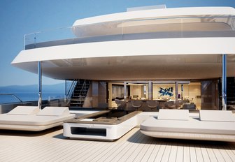 sun beds and al fresco dinning on the upper deck aft of charter yacht NAUTILUS