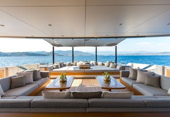 sofas and sunpads on the aft deck of luxury yacht VERTIGE