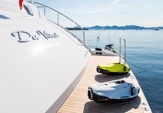 seabobs line up on the swim platform of charter yacht Da Vinci 