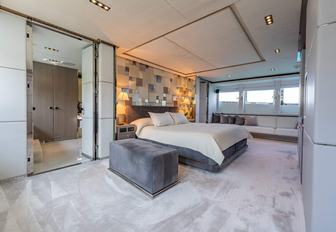 Charter yacht BLISS guest cabin with central berth