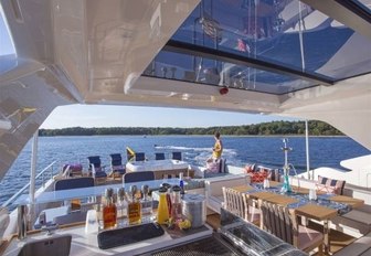 bar, alfresco dining, Jacuzzi and sun loungers on sundeck of luxury yacht Alandrea