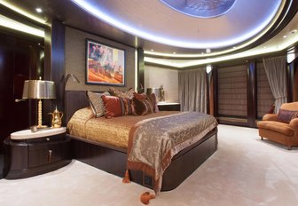 master suite with floor-to-ceiling windows on board luxury yacht KISMET 