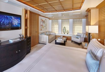 full-beam master suite with lounge aboard motor yacht HANIKON 